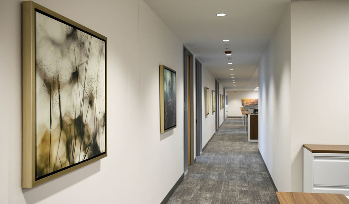 Custom framed artwork installs for Corporate Artworks