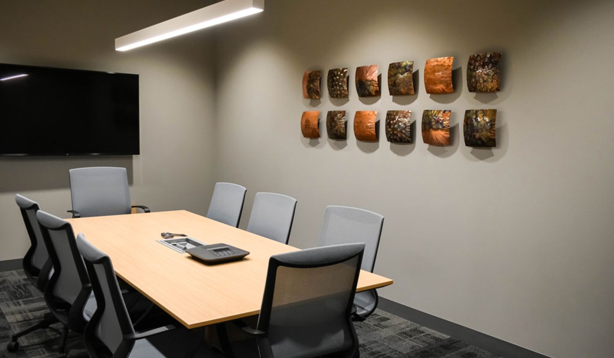 Custom framed artwork installs for Corporate Artworks